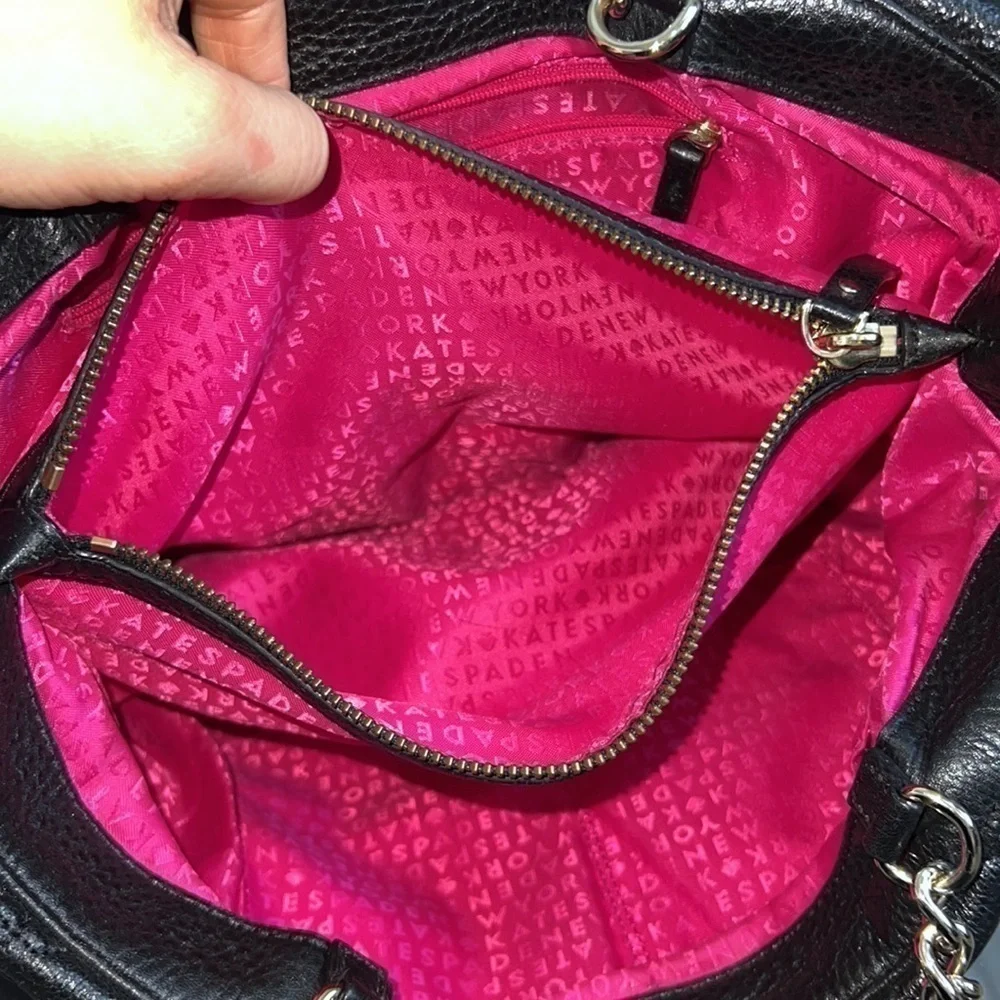 Black Kate Spade purse silver chain straps, pink interior